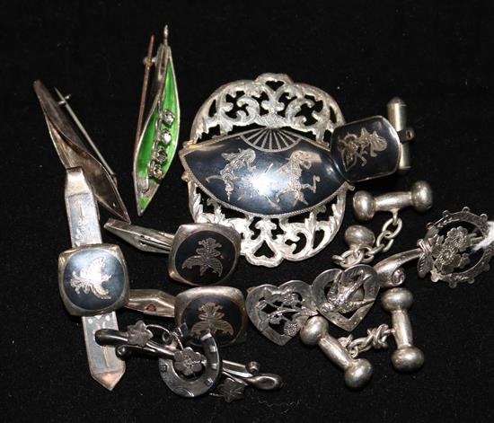 Two early 20th century brooches and other items including silver and niello.